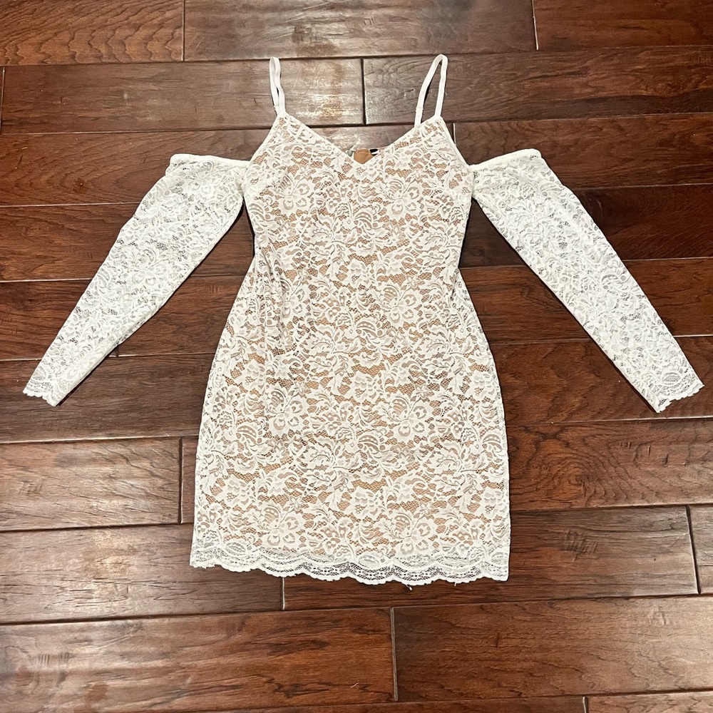 Strappy white lace mini dress with off-the-shoulder long sleeves